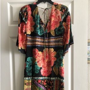 Dress , great for vacation, lite weight .Multi colored, 3/4 sleeves,